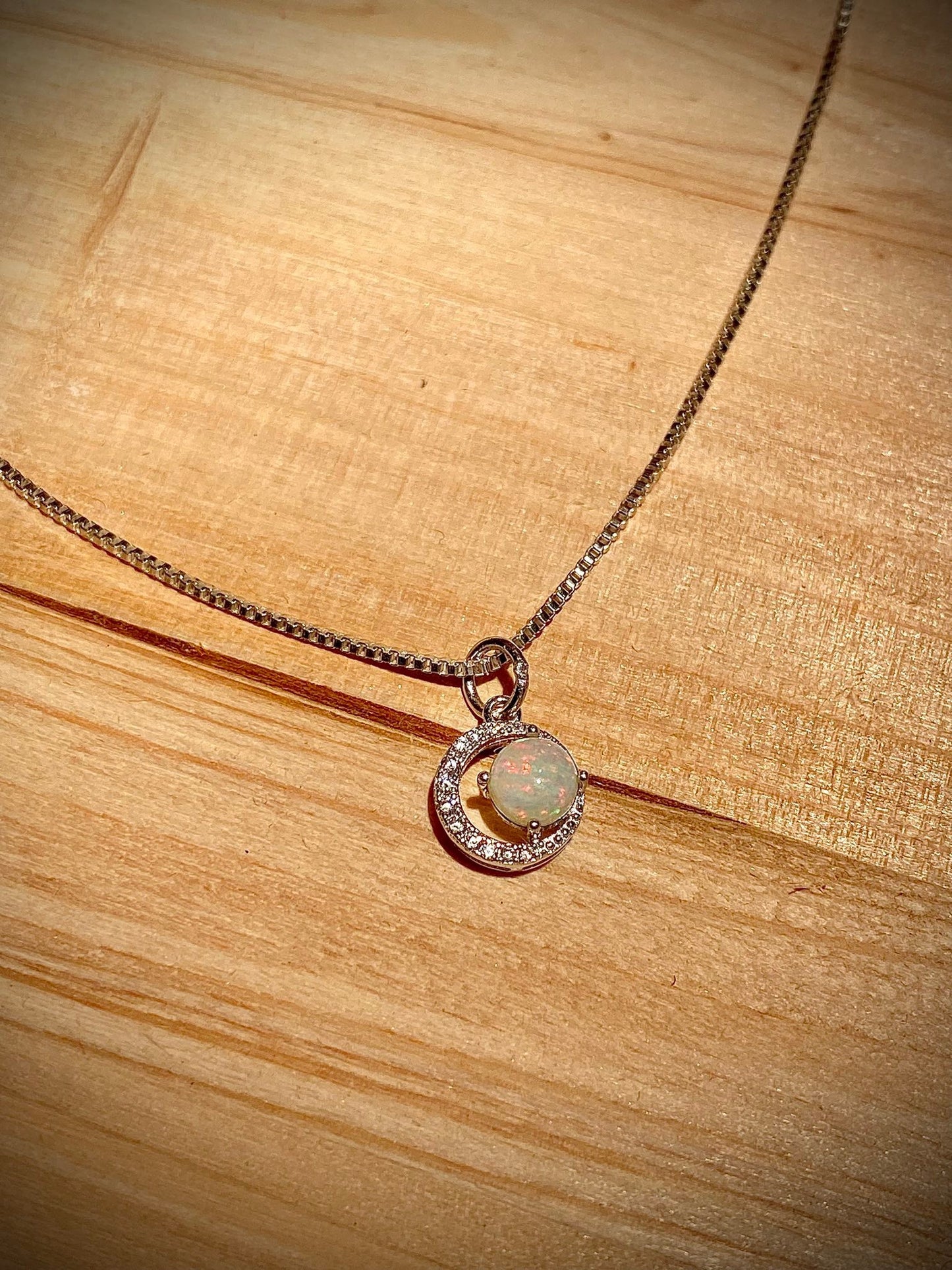 “Crimson Moon” – Red Opal Crescent Pendant